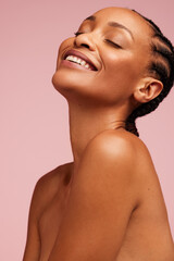 Smiling female model with healthy skin