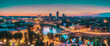 Vilnius, Lithuania, Europe. Sunset Cityscape. Modern Office Buildings Skyscrapers In Business District New City Center Shnipishkes In Night Illuminations. Panorama