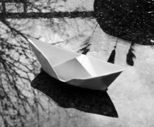 Paper Boat On The Water