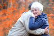 © AnastazjaSoroka - Senior woman hugs man and smiling