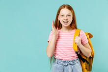 Little Excited Shocked Pupil Redhead Kid Girl 12-13 Year Old In Pink Striped T-shirt Yellow School Bag Backpack Spread Hands Isolated On Pastel Blue Background Children Lifestyle Childhood Concept