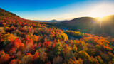 Fototapeta Miasto - Aerial view of Mountain Forests with Brilliant Fall Colors in Autumn at Sunrise, New England