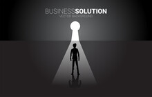 Silhouette Of Businessman Ready To Move Out To Key Hole Door. Find The Solution Concept Vision Mission And Goal Of Business