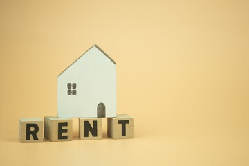 Poster - Wooden blocks with the letters RENT with wood home on top