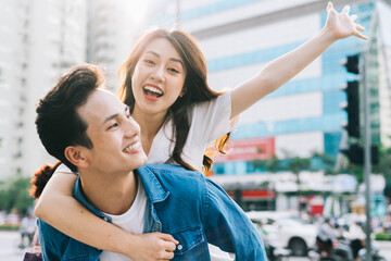 Wall Mural - Boyfriend is carrying his girlfriend on his back