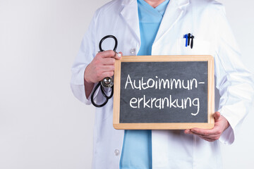 Wall Mural - Arzt mit einer Tafel Autoimmunerkrankungen