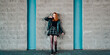 © pavel siamionov - young woman or teenage girl standing outdoor on wall background