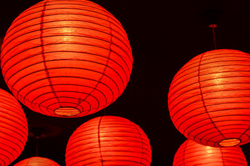 Wall Mural - Traditional Japanese paper lanterns / Red Paper Lanterns in Black Background / For wedding and decorative purposes