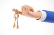 Cartoon human hand in blue suit hold gold key isolated over white background. Real estate concept.