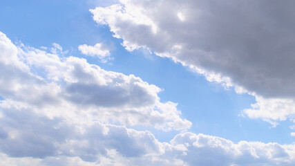 Wall Mural - Beautiful blue spring sky with wind-blown clouds	