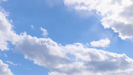 Wall Mural - Beautiful blue spring sky with wind-blown clouds	