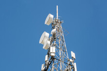 Radio, Communication And Cell Tower On Blue Sky Background