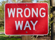A Close View Of The Wrong Way Sign.