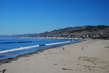 A Sunny Afternoon Look Along The Shoreline Of Pismo Beach, San Louis Obispo County California.