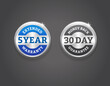 © redheadedgirl - Extended 5 year warranty and 30 day money back guarantee round metallic badges. Vector silver labels on grey background for product packaging