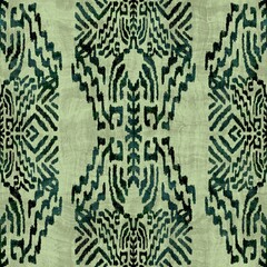 Seamless grungy tribal ethnic rug motif pattern. High quality illustration. Distressed old looking native style design in shades of textured green. Old artisan textile seamless pattern.