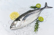 mackerel scad, Fish on ice for cooking food in the restaurant, Fresh fish raw torpedo scad with lemon, top view