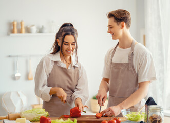 loving couple is preparing the proper meal