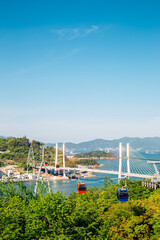 Wall Mural - Dolsan park Geobukseon Bridge and cable car with sea in Yeosu, Korea