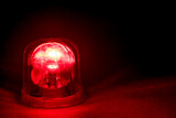 Fototapeta  - Emergency rotating alarm red light at night.