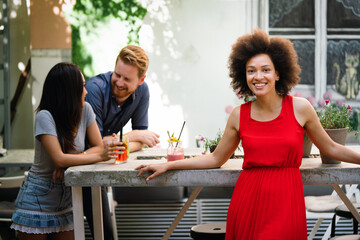 Poster - Group of friends having fun together. People talking laughing and enjoying their time