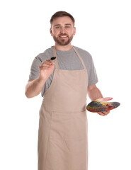 Poster - Man painting with brush on white background. Young artist