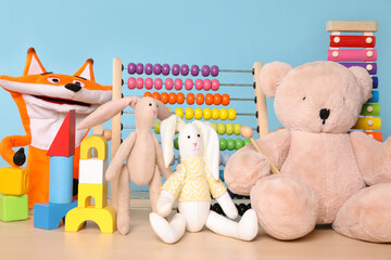 Poster - Collection of different toys on wooden table