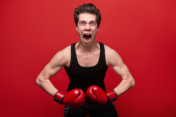 funny angry fighter in boxing gloves