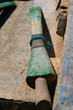 selective focus of old weathered wood boat paddle