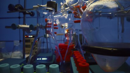 Canvas Print - Chemical laboratory with flasks and test tubes. Chemical process with boiling of a chemical solution and synthesis of organic matter