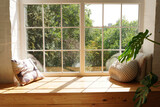 Bright scandinavian room interior with green plant monstera and sunlights, white window sill, pillows