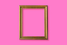Gold Photo Frame In A Pink Wall