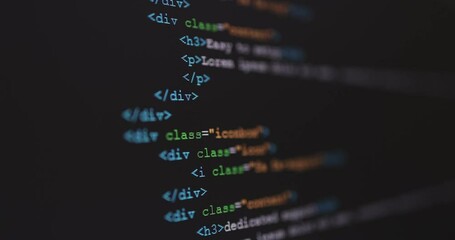 4k close up shot html tag code on pc monitor scroll down. background concept for programming and cod