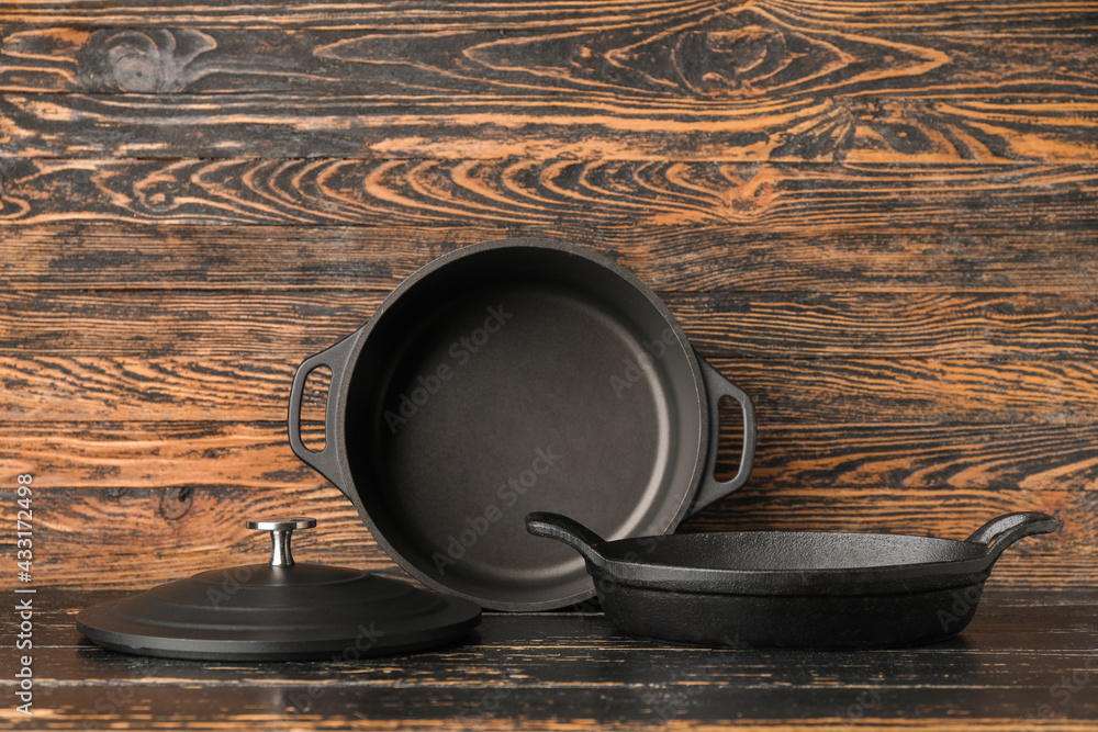 Set of kitchen utensils on dark wooden background
