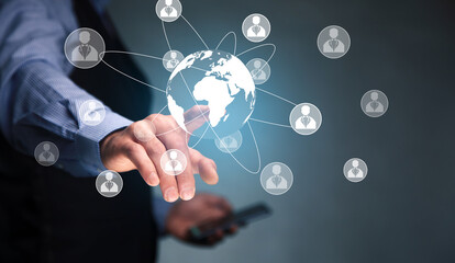 man holding smart phone with global network