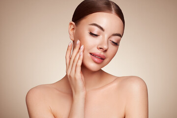 portrait beautiful young woman with clean fresh skin. model with healthy skin, close up portrait. co
