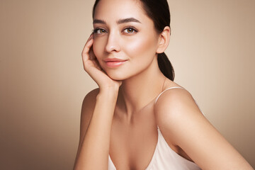 Wall Mural - portrait beautiful young woman with clean fresh skin. model with healthy skin, close up portrait. co