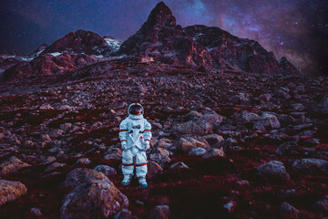 Wall Mural - astronaut exploring a new planet. searching for a new home for humanity. concept about science and n