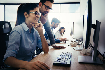 Wall Mural - creative people working in office on computer