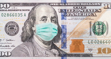 US quarantine, 100 dollar banknote with medical mask. The concept of epidemic and protection against coronavrius. 