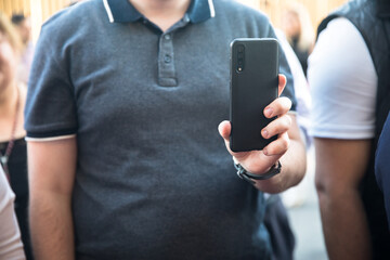 Wall Mural - man holding smart phone