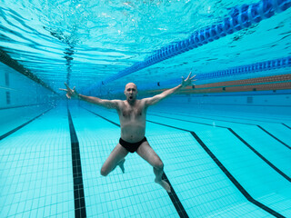 swimming in the pool at the swimming stadium