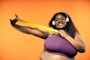 Young woman making pilates and functional training at the gym