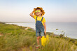 © Igor Yaruta - Happy child against blue sea and sky background