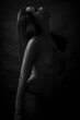 © Vladimir Arndt - Slim topless woman. Toned in black and white.