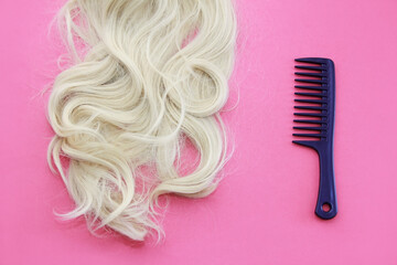  lock of white hair and a comb