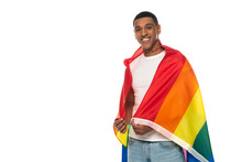 Young African American Man, Wrapped In Lgbt Flag, Smiling At Camera Isolated On White