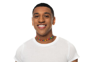 african american man in rainbow colors beads smiling at camera isolated on white, lgbt concept