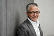 © Sandro J√∂dicke/Westend61 - Happy male investor in balzer jacket