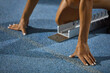 © Trevor Adeline/Caia Image - Close up female track and field athlete at starting block